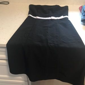 Black strapless dress with white bow